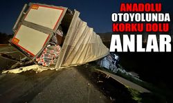 Anadolu Otoyolu'nda lastiği patlayan tır şarampole devrildi