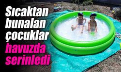 Sıcaktan bunalan çocuklar havuzda serinledi
