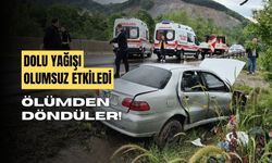 Dolu yağışı nedeniyle kontrolden çıkan otomobil, kanala uçtu