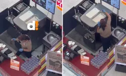 Görüntülendiğinden haberi yoktu! Ünlü markanın şubesinde mide bulandıran hareket