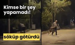 Bolu’da yaşlı adam, kaldırımdaki bankı kırarak, söküp götürdü