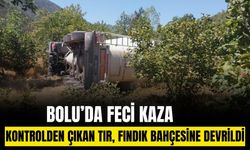Bolu'da kontrolden çıkan tır fındık bahçesine devrildi