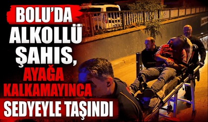 Alkollü şahıs, ayağa kalkamayınca sedyeyle taşındı