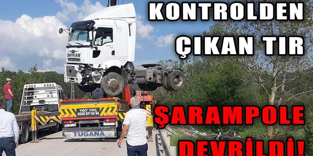 DEVRİLEN TIRDAN YARA ALMADAN KURTULDU