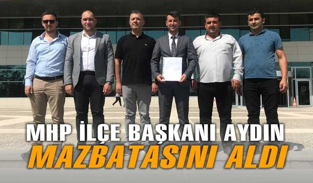 Bolu MHP Merkez İlçe Başkanı Hakan Aydın, mazbatasını aldı