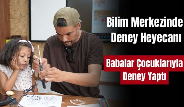 Bilim merkezinde babalar çocukları deney yaptı