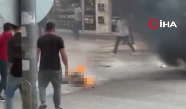 Sokak ortasında benzinle kendini yaktı