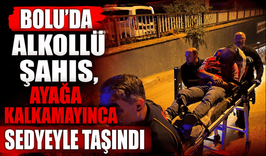 Alkollü şahıs, ayağa kalkamayınca sedyeyle taşındı
